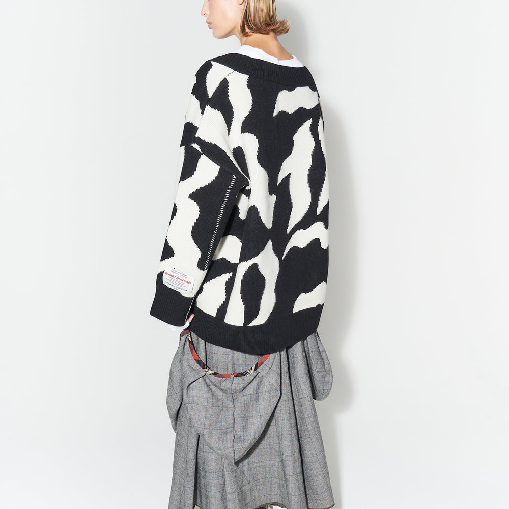 
                      
                        Trappist Cardigan
                      
                    